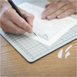 Tapis de coupe quadrillé