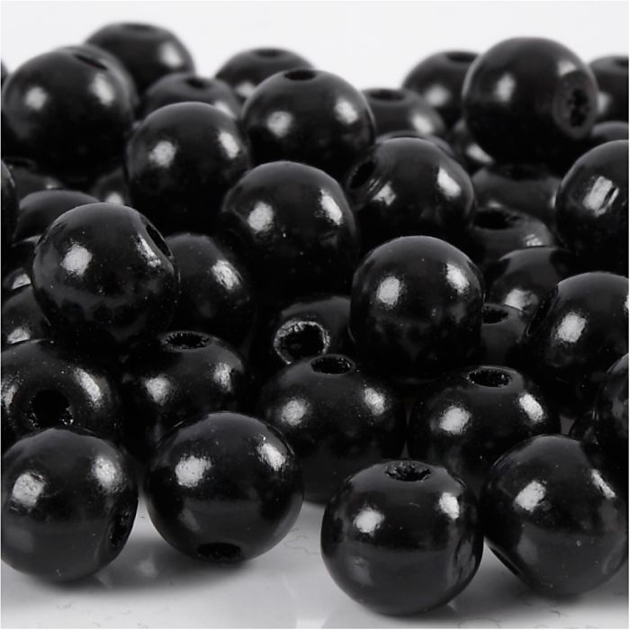 Perles en Bois, d 10 mm, diamètre intérieur 3 mm, ca. 70 pièce, noir, 20 gr/ 1 Pq.