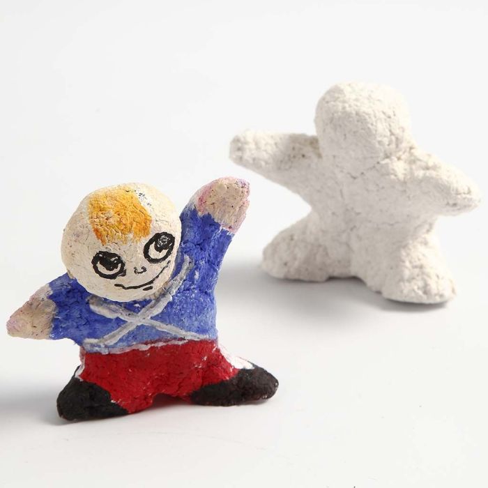 A small Figure with a painted Uniform made from Papier-mâché Pulp
