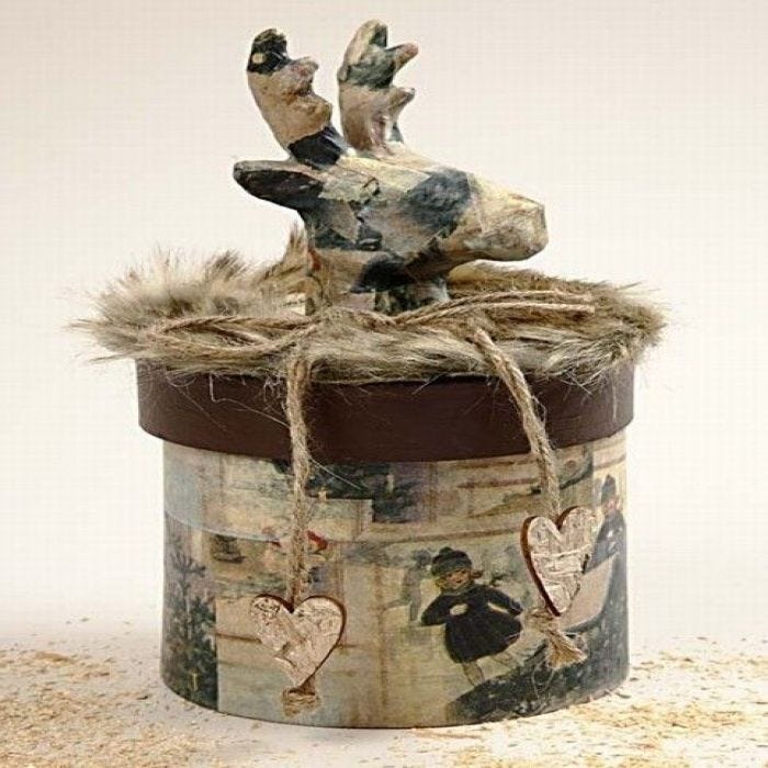 A Deer on a Round Box