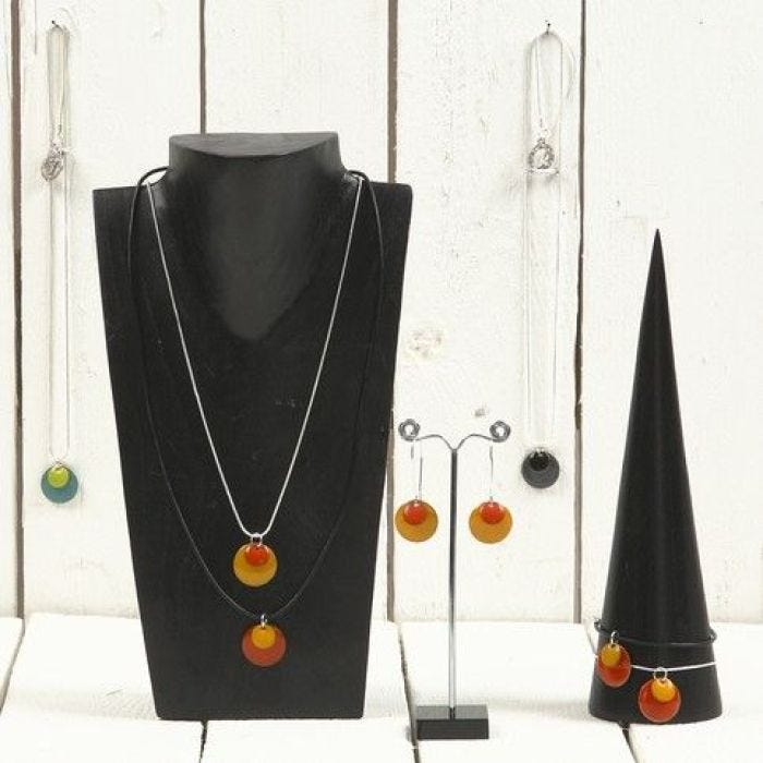 A Necklace and Earrings with Metal Discs