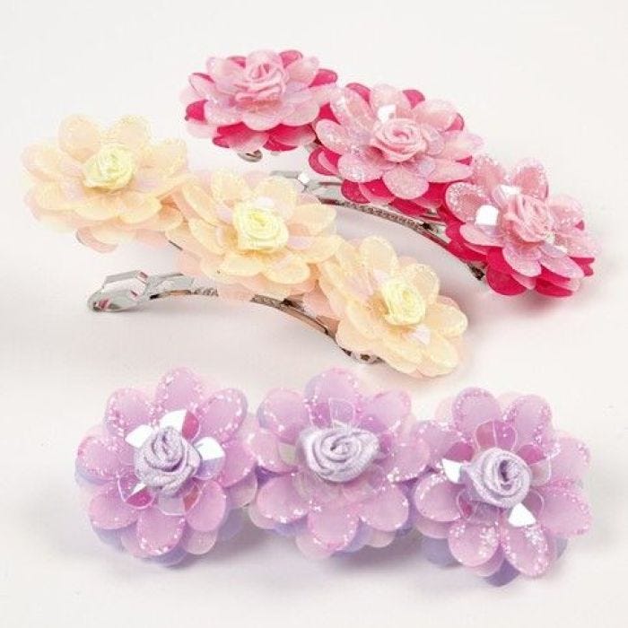 Barrettes décorées de fleurs en organza et de sequins roses