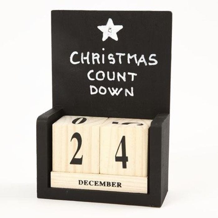 A wooden Desktop Calendar painted with black Blackboard Paint