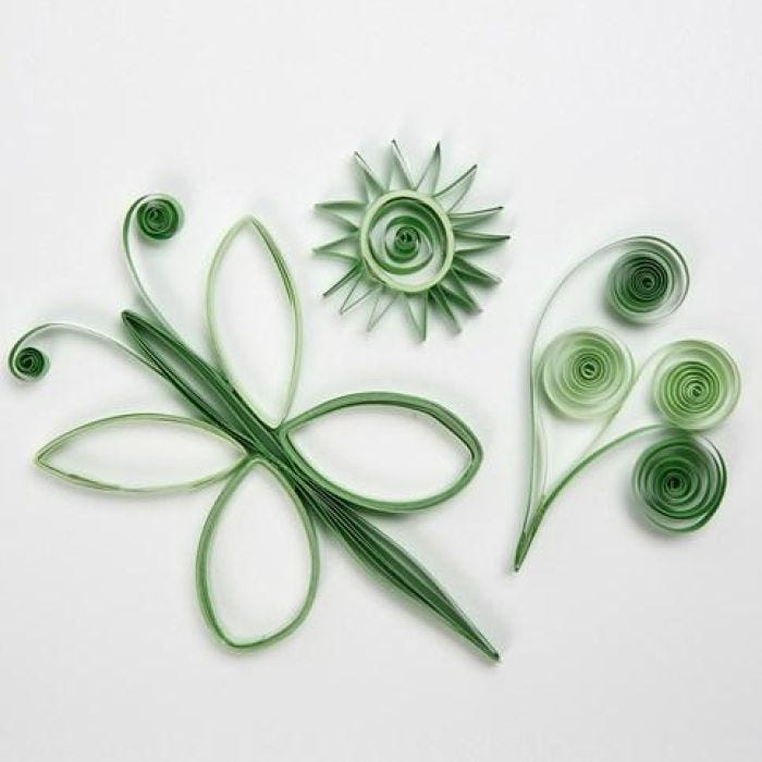 Des formes en papier faites à paritr de bandes pour quilling