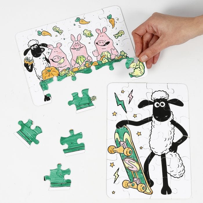 Un puzzle Shaun le Mouton décoré aux feutres