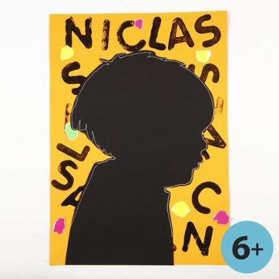 Une silhouette en papier cartonn&eacute; noir avec un fond d&eacute;cor&eacute;