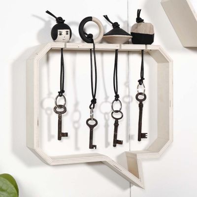 Wooden Keyring Fobs in a Shelf with a Groove