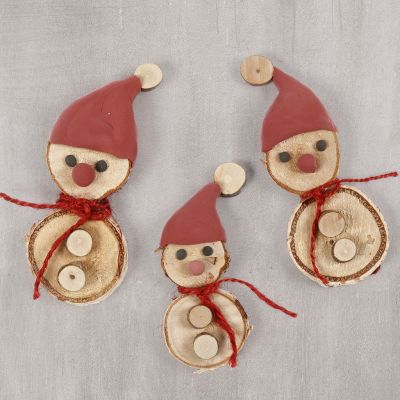 Elfes réalisés à partir de disques en bois avec un chapeau d’elfe en Silk Clay