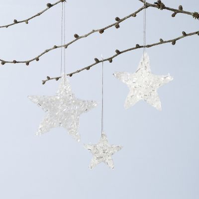 Décorations suspendues en forme d’étoile brillante réalisées avec de la colle Sticky Base et des paillettes