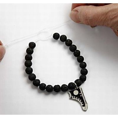 A bracelet made from beads and a charm