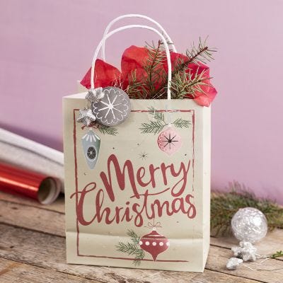 Un sac cadeau avec un motif de Noël