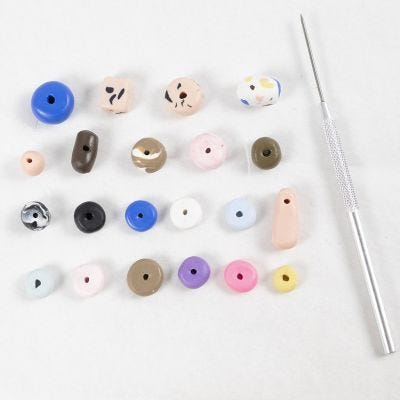Comment fabriquer des perles en pâte polymère fine
