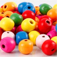 Mélange de perles en bois, d 10 mm, diamètre intérieur 2,5-3 mm, ass. de couleurs, 22 gr/ 1 Pq.