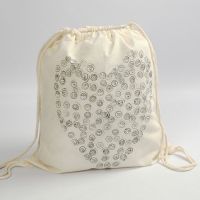 A Shoe Bag with Stamp printed Smilies in a Heart Shape