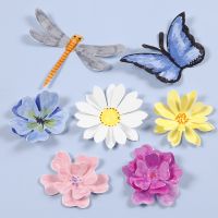 Insectes et fleurs poinçonnés avec effet 3D