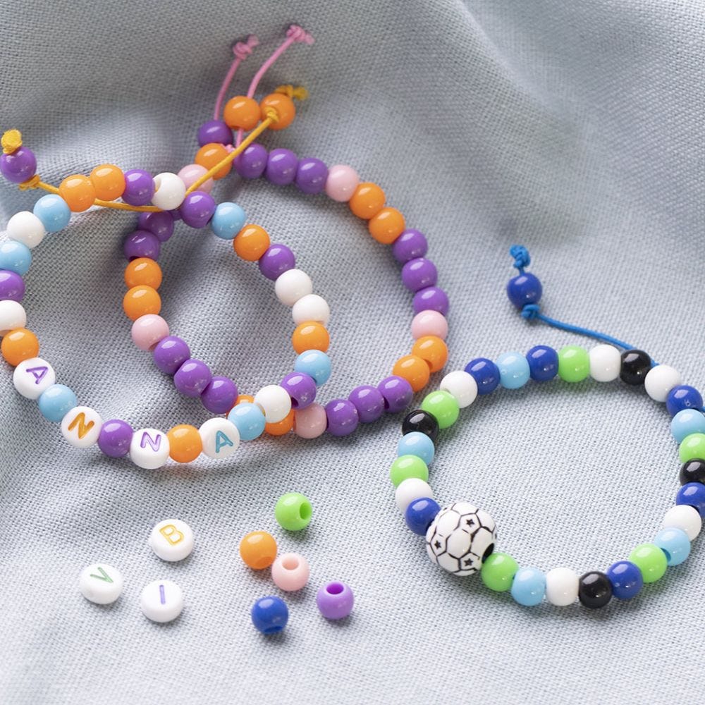 Bracelets made from coloured Elastic Cord and Plastic Beads